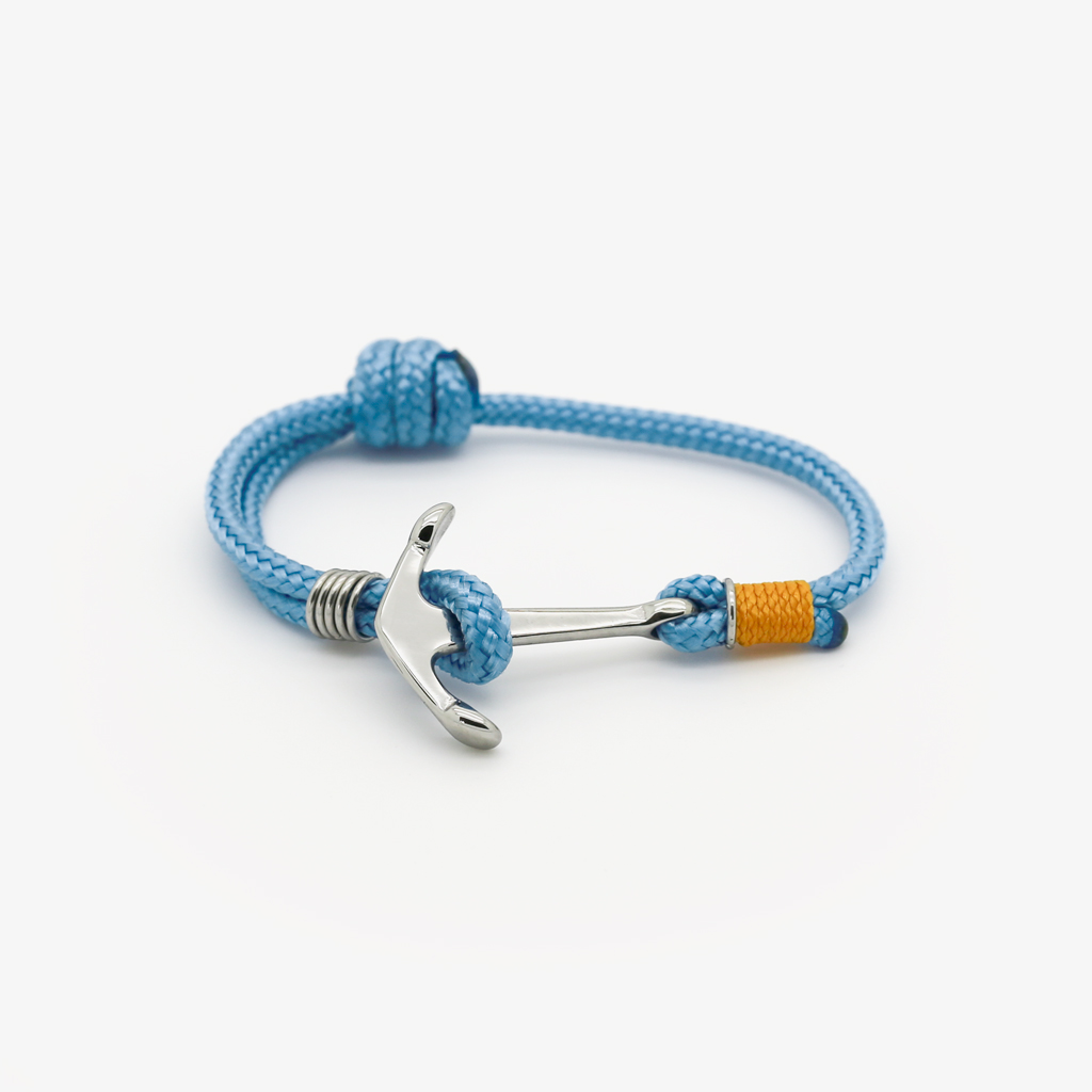 Bracelet enfant en corde bleu avec attache ancre marine, vue produit sur fond blanc, Monzémaré